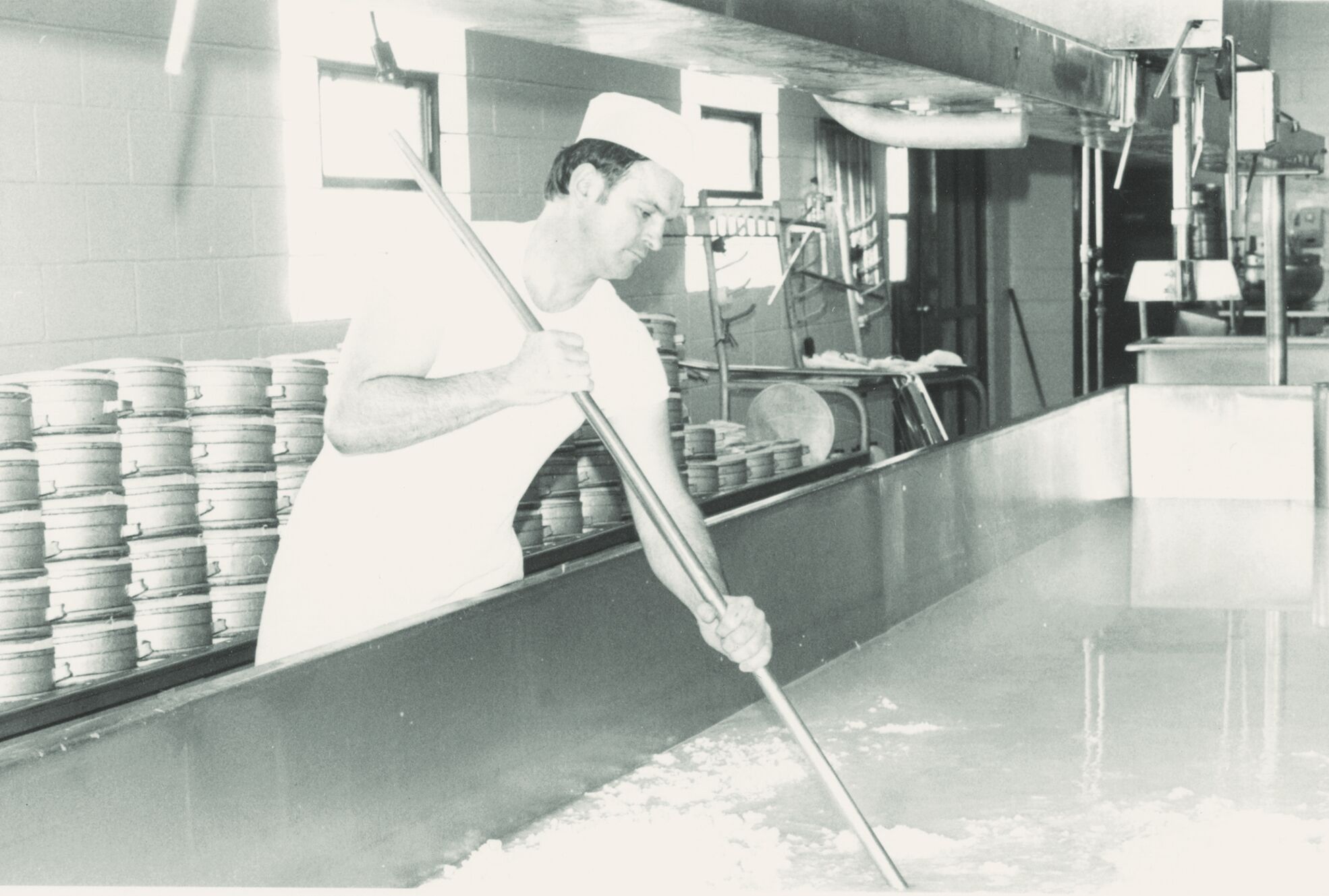 Everett separating cheese into banks for Henning Cheese.