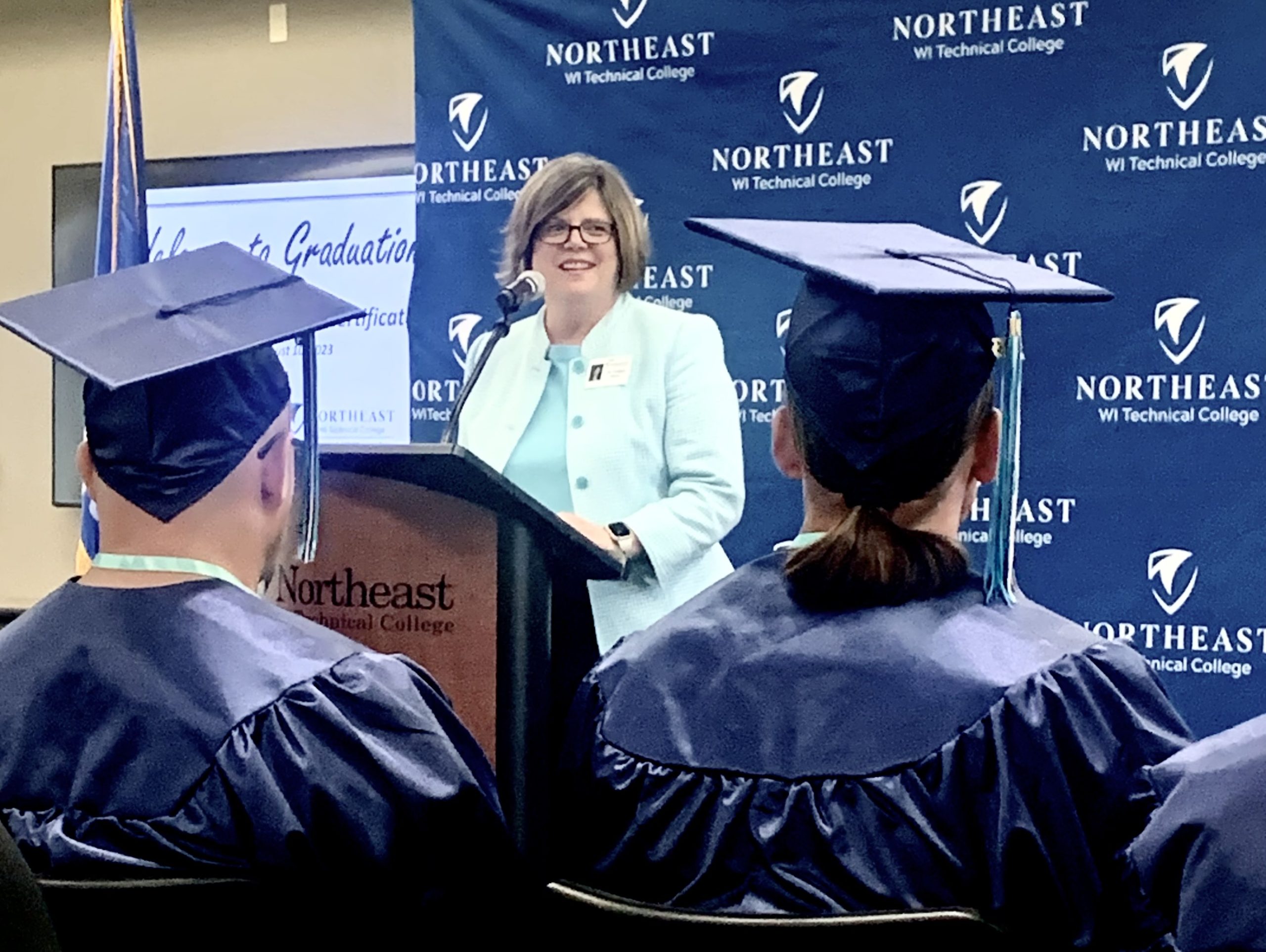 Kristen Raney, president of NWTC, speaks to graduates.