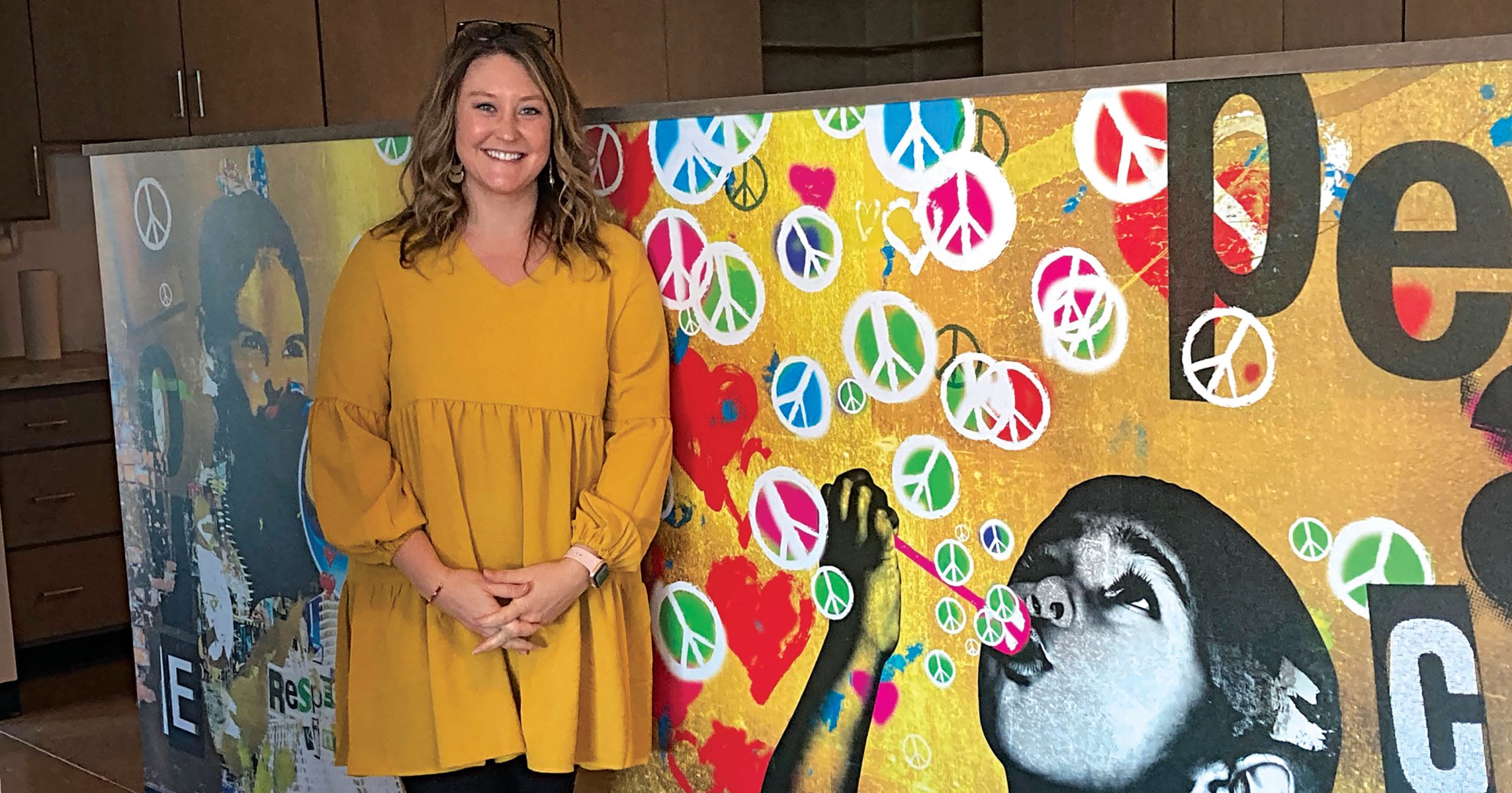 Natalie Bomstad serves as executive director of Wello, a Green Bay nonprofit dedicated to advancing community health and well-being.