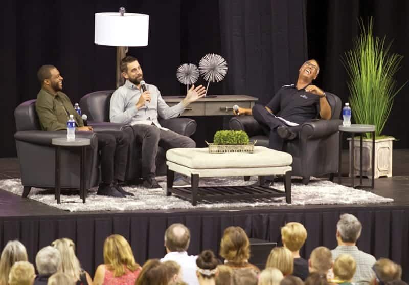 From left, Packers’ Randall Cobb, Aaron Rogers, and President and CEO of Prevea Health Dr. Ashok Rai on stage during Prevea Get After It LIVE at the University of Green Bay Kress Events Center. Media by Sue Pischke, 2017 ALL RIGHTS RESERVED
