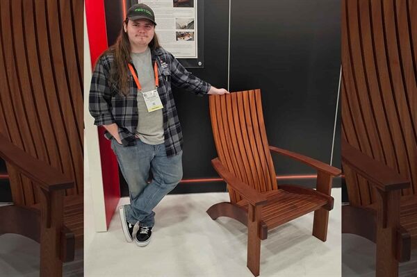Pacey Berken poses with one of his award-winning chairs.