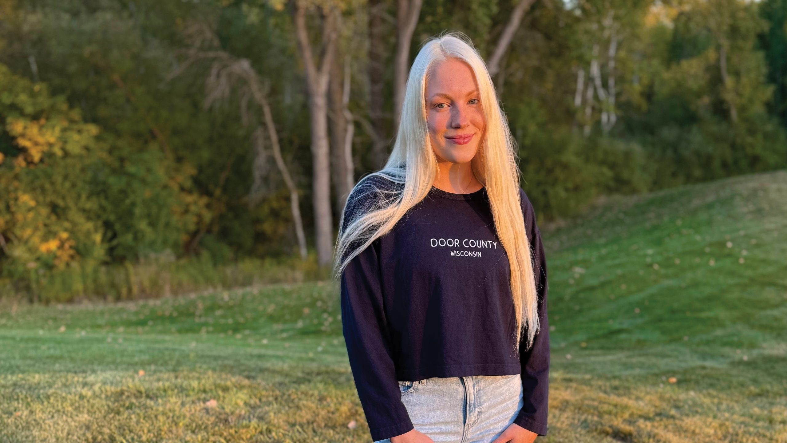 Korie Fleischman wears a Door Born shirt.