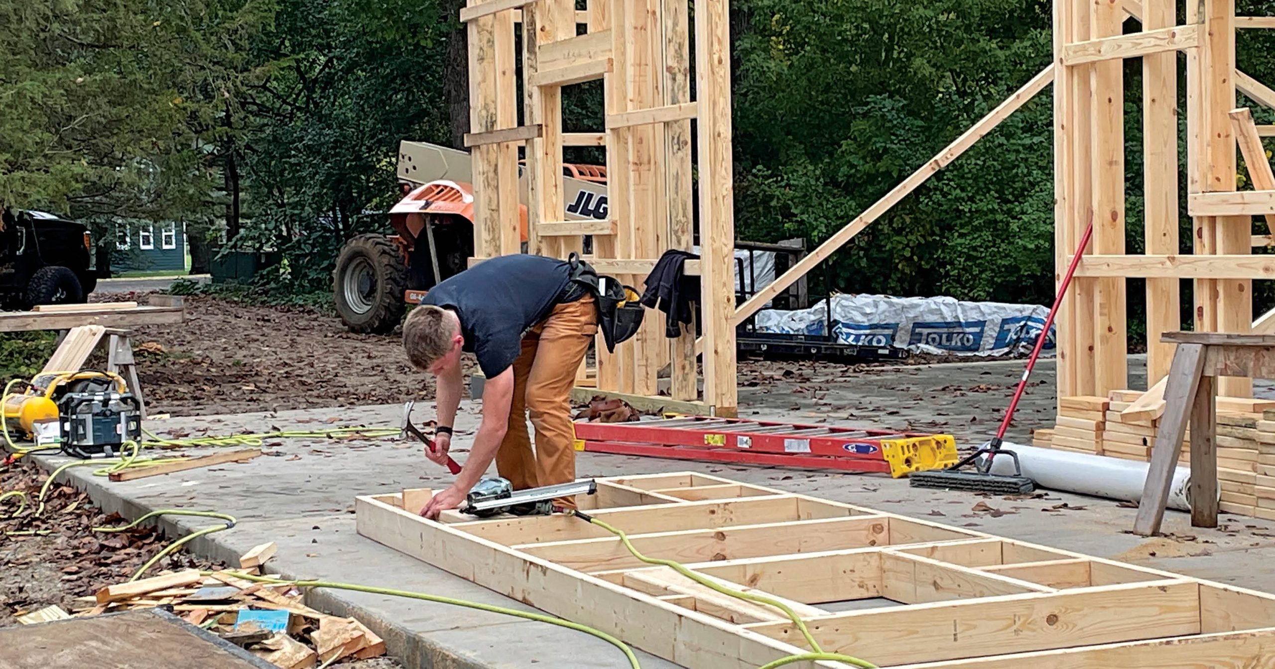 Ripon High School student Henry Walheim works as a construction apprentice. Advocates say youth apprenticeship delivers benefits to students and employers alike.