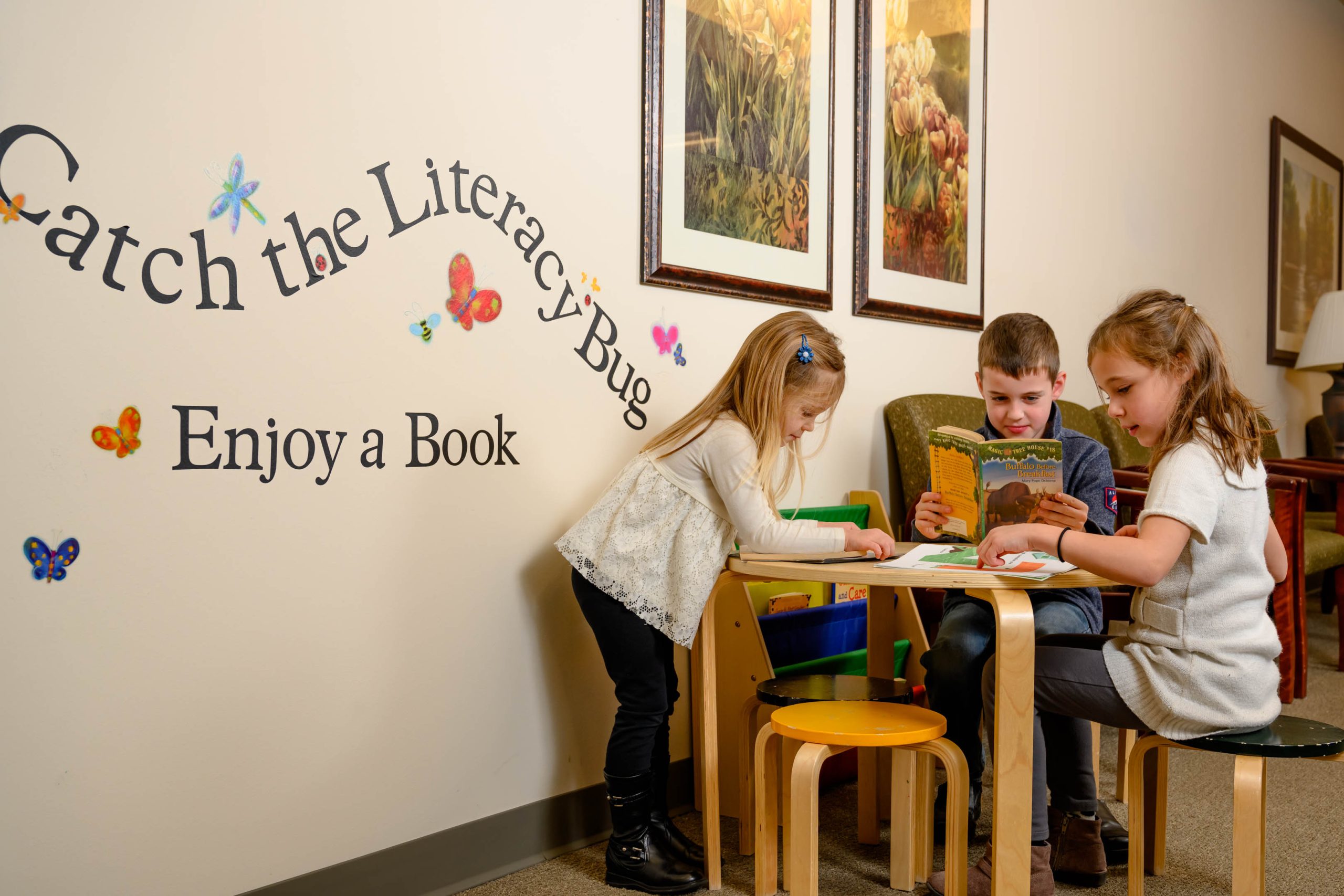 Dr. Mindy Frimodig with a family that has taken advantage of the Reach Out and Read program. Taken at the Shawano clinic location on Nov. 26.