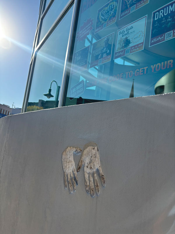 Oscar C. Boldt’s handprints are embedded in a wall of the Fox Cities Performing Arts Center, representing Boldt’s enduring commitment.