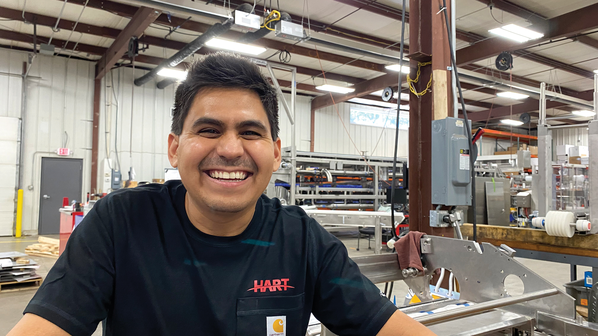 Carlos Martinez, a 2024 NEW Manufacturing Alliance All Stars honoree, immigrated from Mexico for an engineering position at HART Design & Manufacturing in Green Bay. Experts say importing top talent from outside the U.S. is a key opportunity and strategy that should be embraced by Wisconsin manufacturers grappling with workforce shortages.
