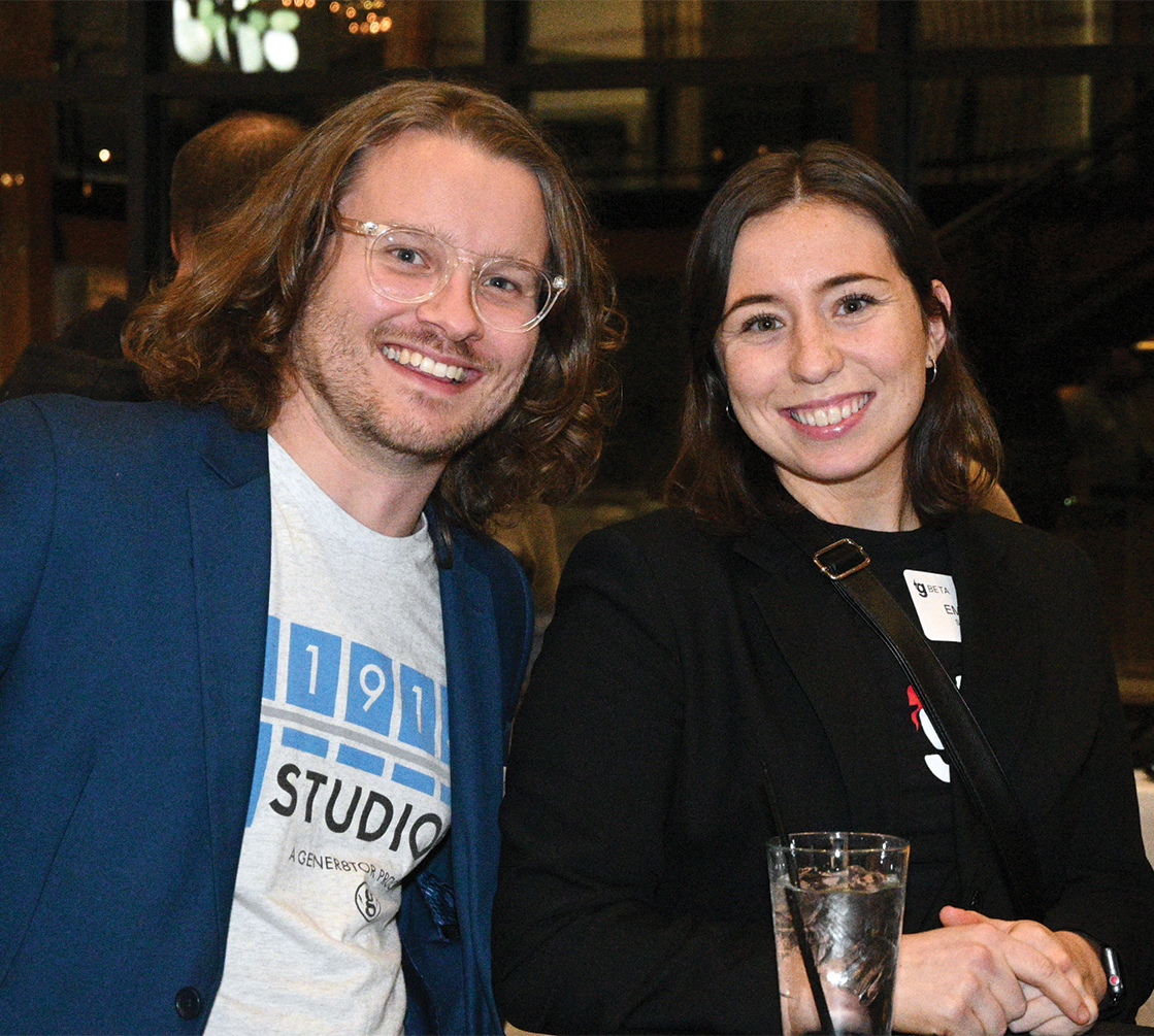 Fellow gener8tor employees Andrew Schmitz and Emma Snyder, who run the US Venture accelerator, attend the 1915 Studios fall 2022 showcase event in December.