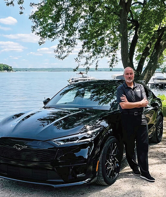 Rob Dresen, managing partner for Homan Ford & Chrysler in Ripon, owns a Mustang Mach E after a positive experience with an EV rental car.