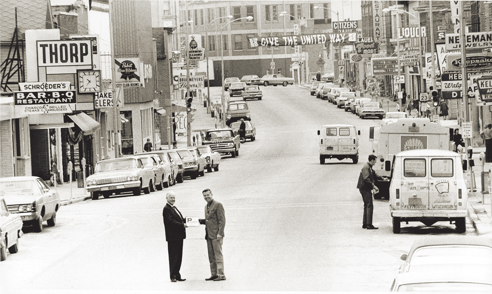 Joe Van Horn poses for a photo in downtown Plymouth with Mayor Clair Burrill in 1970, four years after he relocated from Chicago and bought the downtown Chevrolet dealership.