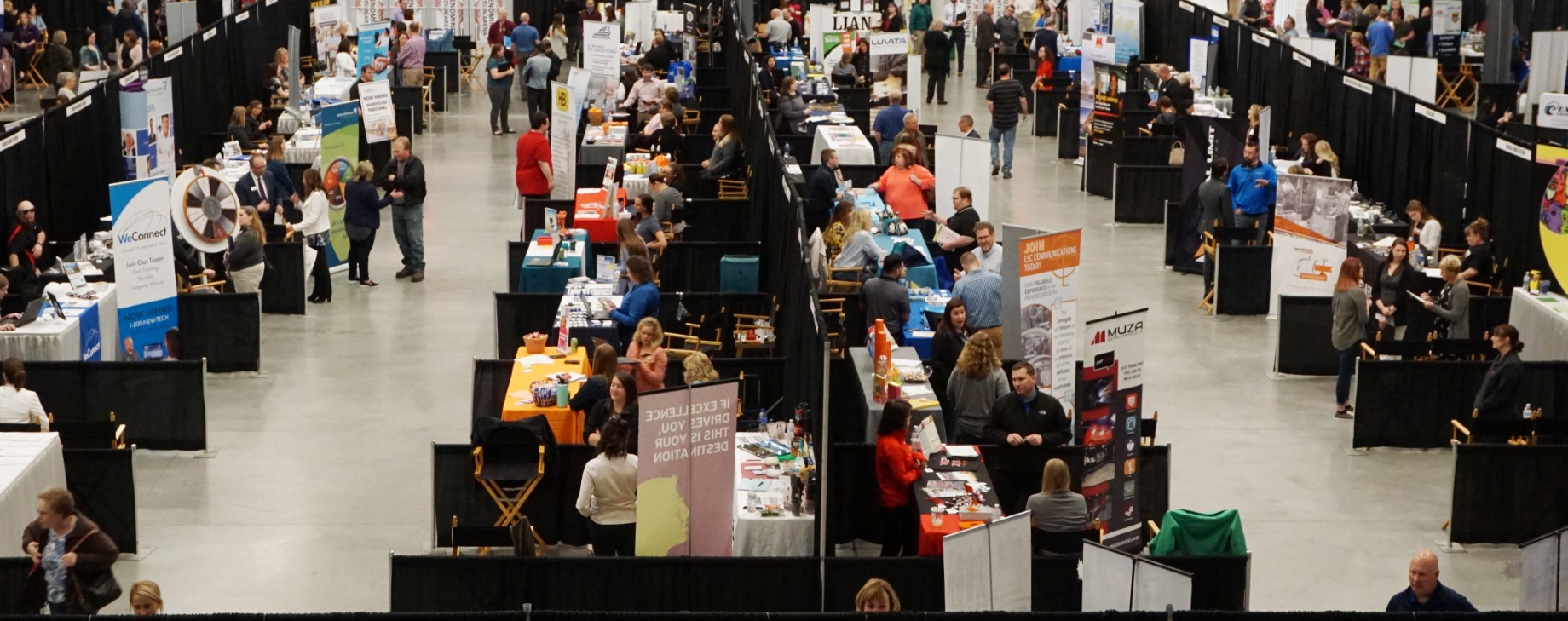 A past job fair shows lots of employers ready to meet job seekers..jpg