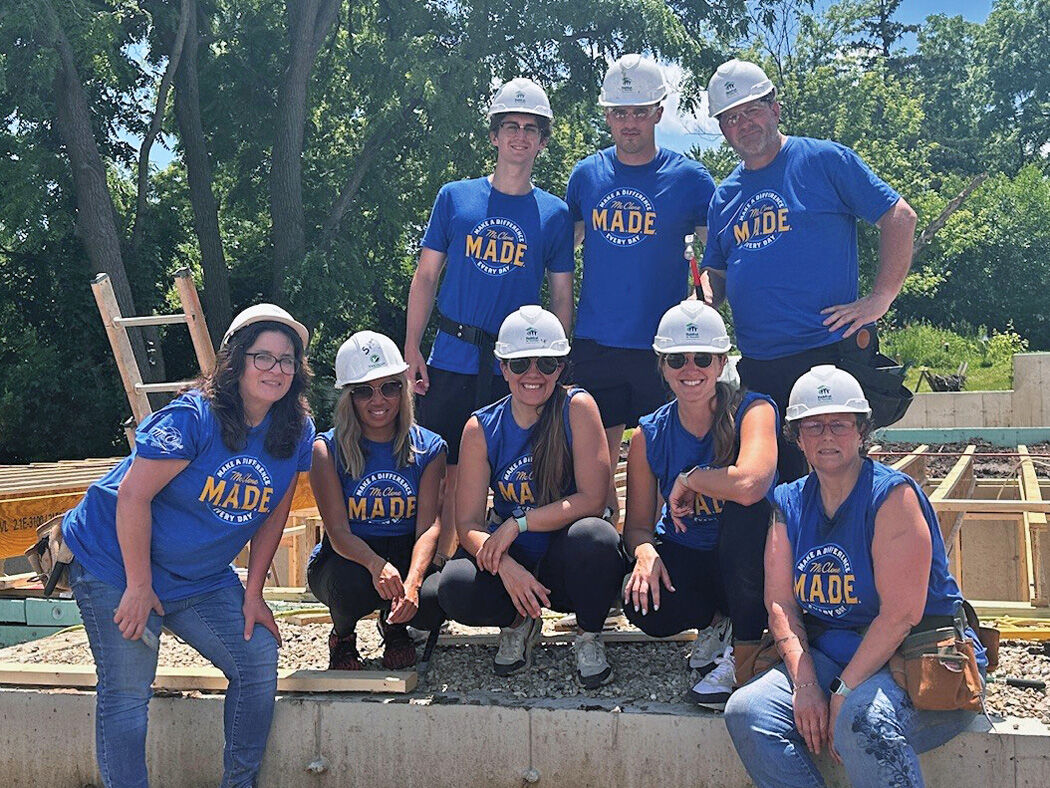 Team members receive paid volunteer time off to support causes such as Habitat for Humanity.