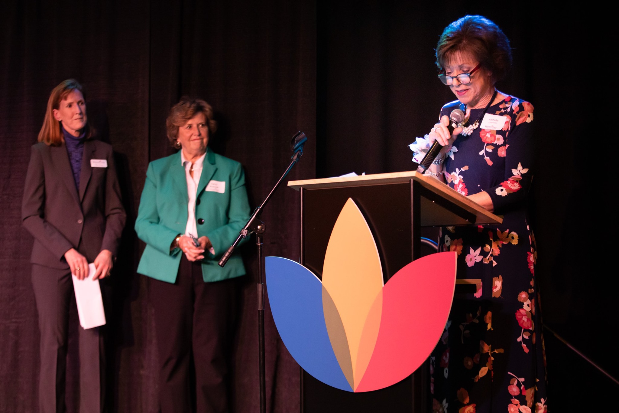March 2020 – Dr. Michelle Langenfeld accepts the 2020 Nancy Armbrust Impact Award. Pictured from left: Former Women’s Fund President Kate Hogan; Nancy Armbrust; Dr. Michelle Langenfeld.