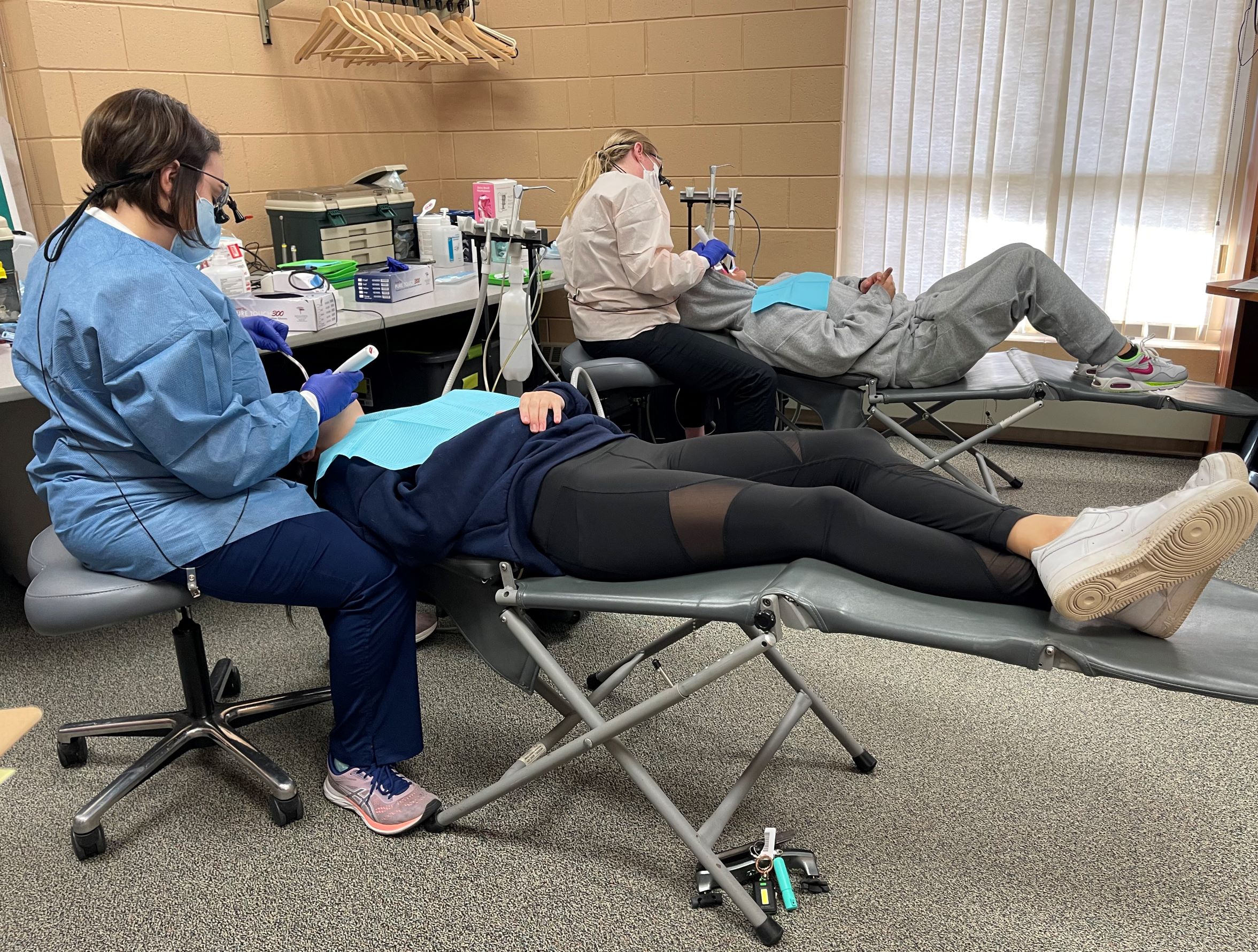 Hygienists clean the teeth of local high school students right at their school. OHP has seven permanent dental sites at schools in Brown County. For other schools, the team will set up in libraries, locker rooms, hallways or wherever there is enough space.