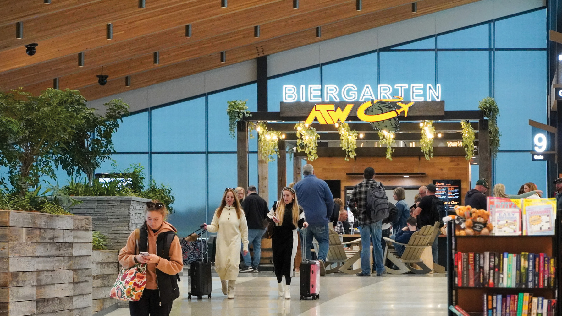 ATW’s concourse expansion includes plenty of new features to reduce stress and bring local touches into the airport, including an atrium-like space featuring a biergarten with a local brew made just for ATW.