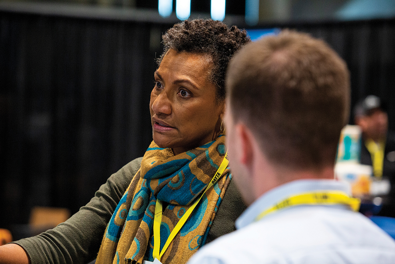 Sala Sander, project coordinator for the Wisconsin IoT Council, connects with colleagues at the 12th annual Manufacturing First Expo & Conference. This year’s event was the largest ever, with 277 exhibitor booths on the Resch Expo floor.
