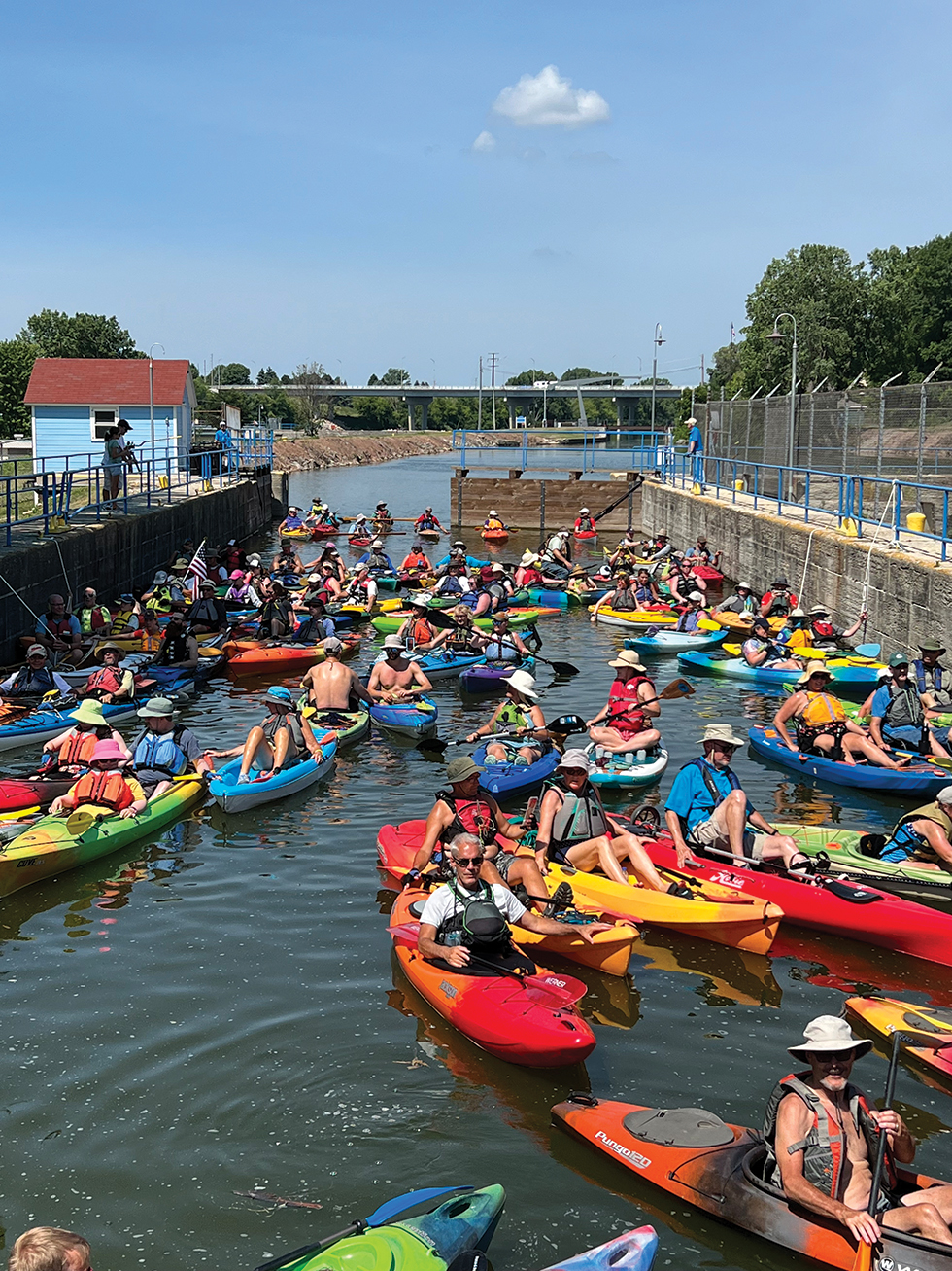 At its height of popularity, the Northeast Wisconsin Paddlers’ “Park to Park” paddle saw nearly 200 boats navigate through the Fox Locks. The once-annual event ceased in 2015 upon closure of the Menasha Lock due to invasive round goby.
