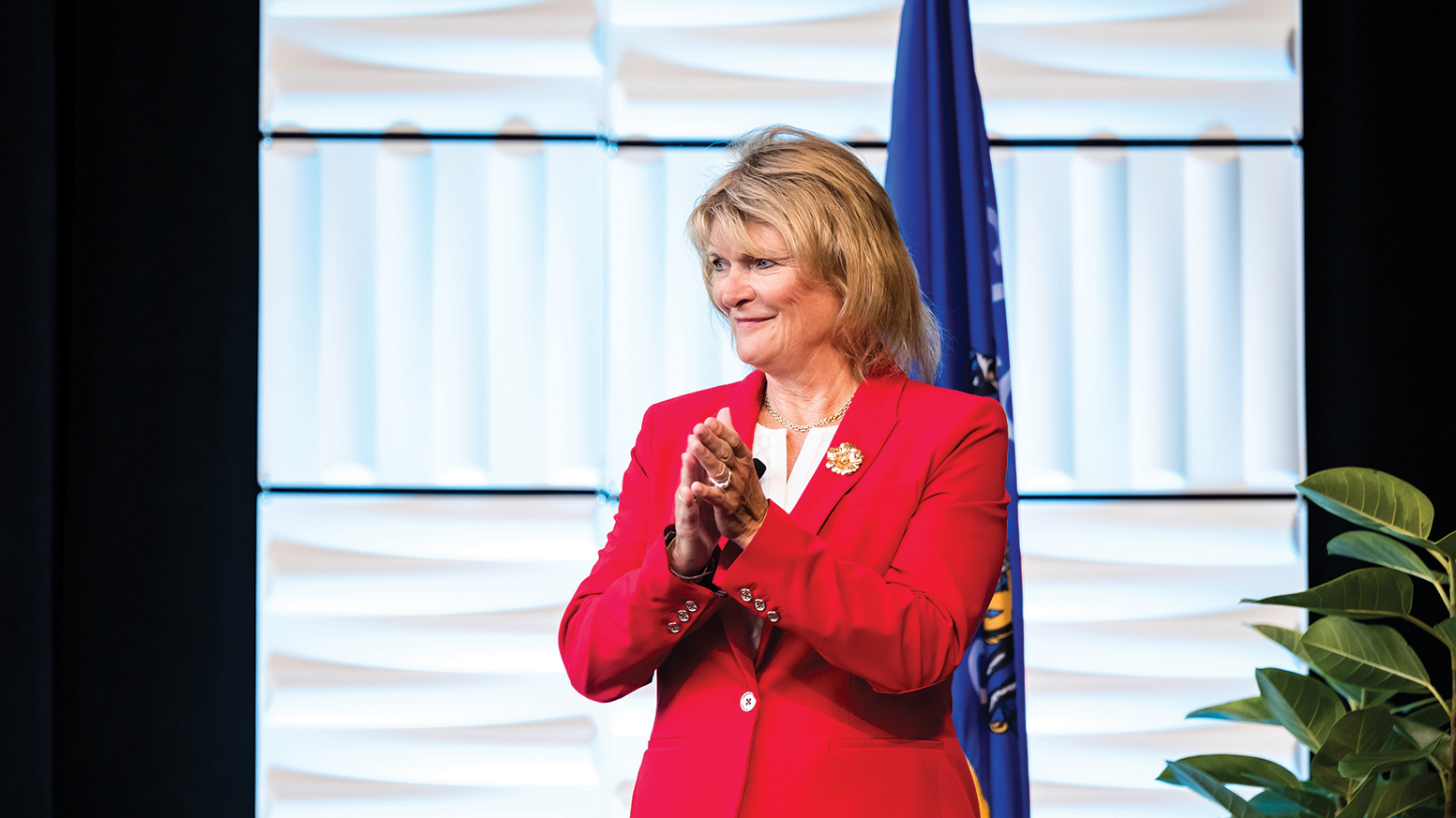 New North, Inc. board co-chair Mary Goggans takes the stage at the organization’s annual summit June 6, the day her co-chair appointment was announced publicly. She replaces Microsoft’s Michelle Schuler in the role.