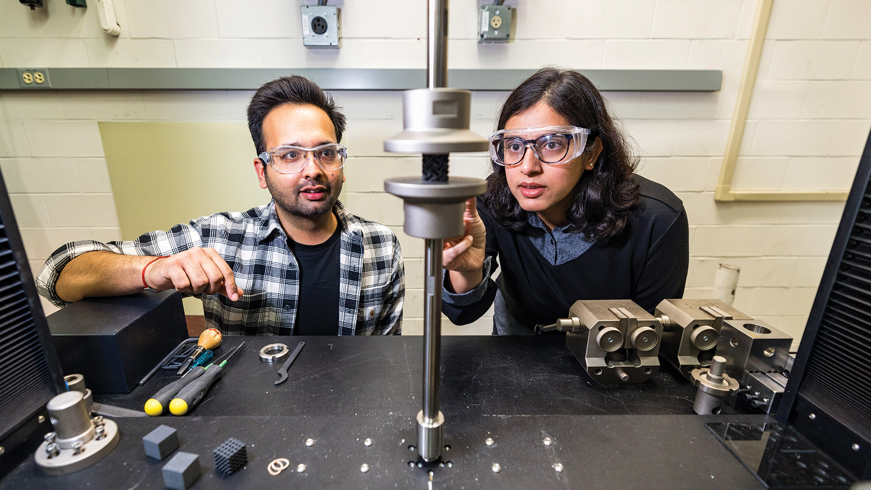 Pavana Prabhakar (right) and graduate researcher Hridyesh Tewani (left) developed a new technique for developing 3D-printed syntactic foams.