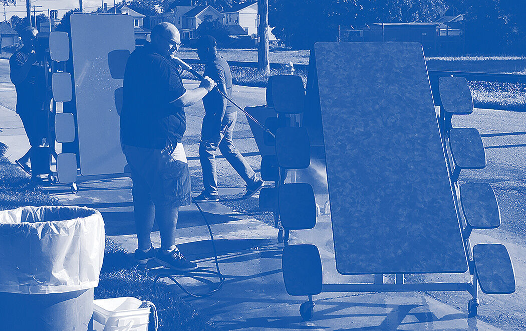 Giving back to the community is important to Blue Door Consulting. Here, Mark Cyrulik, senior Fullstack developer and team lead, pitches in at a service day at the Oshkosh Boys & Girls Club.