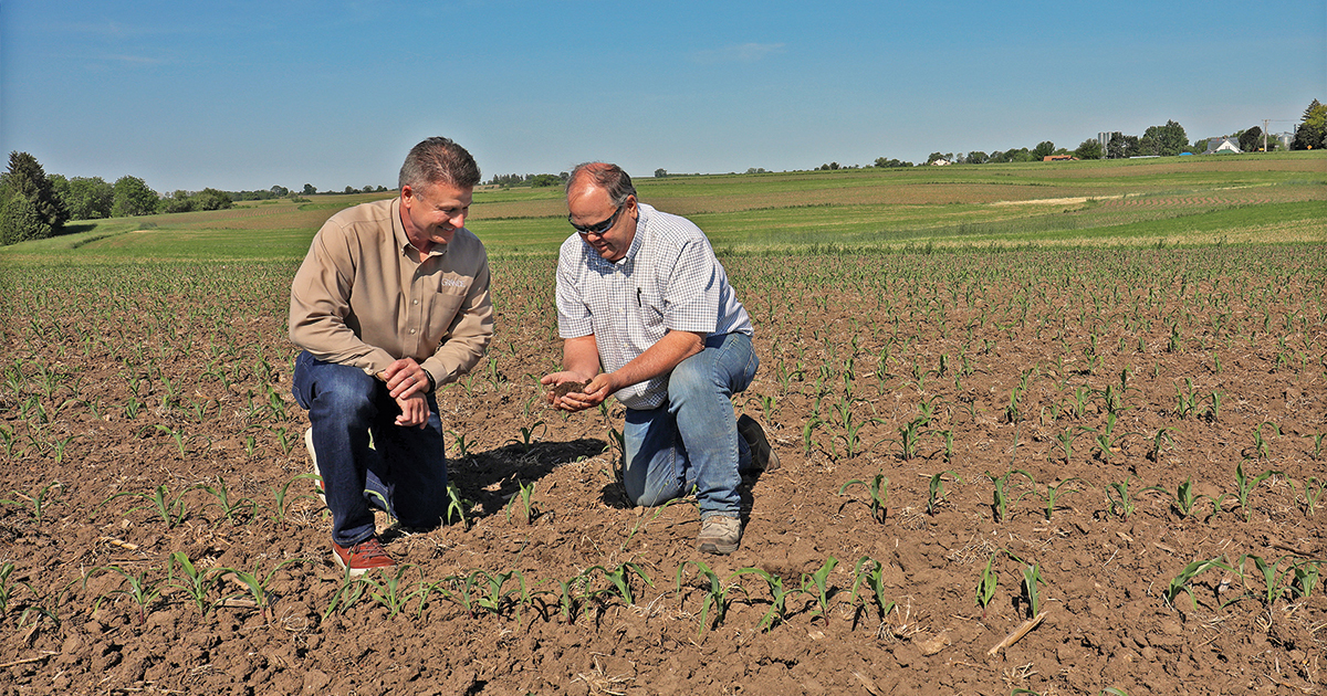 Greg Siegenthaler, left, of Grande Cheese, and dairy farmer Jim Winn advocate for the importance of water quality and conservation in farming.