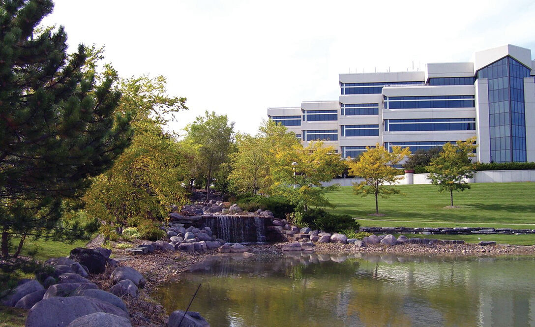 T. Wall Enterprises acquired the former American Medical Security headquarters in hopes of creating as many as 1,000 luxury apartments.