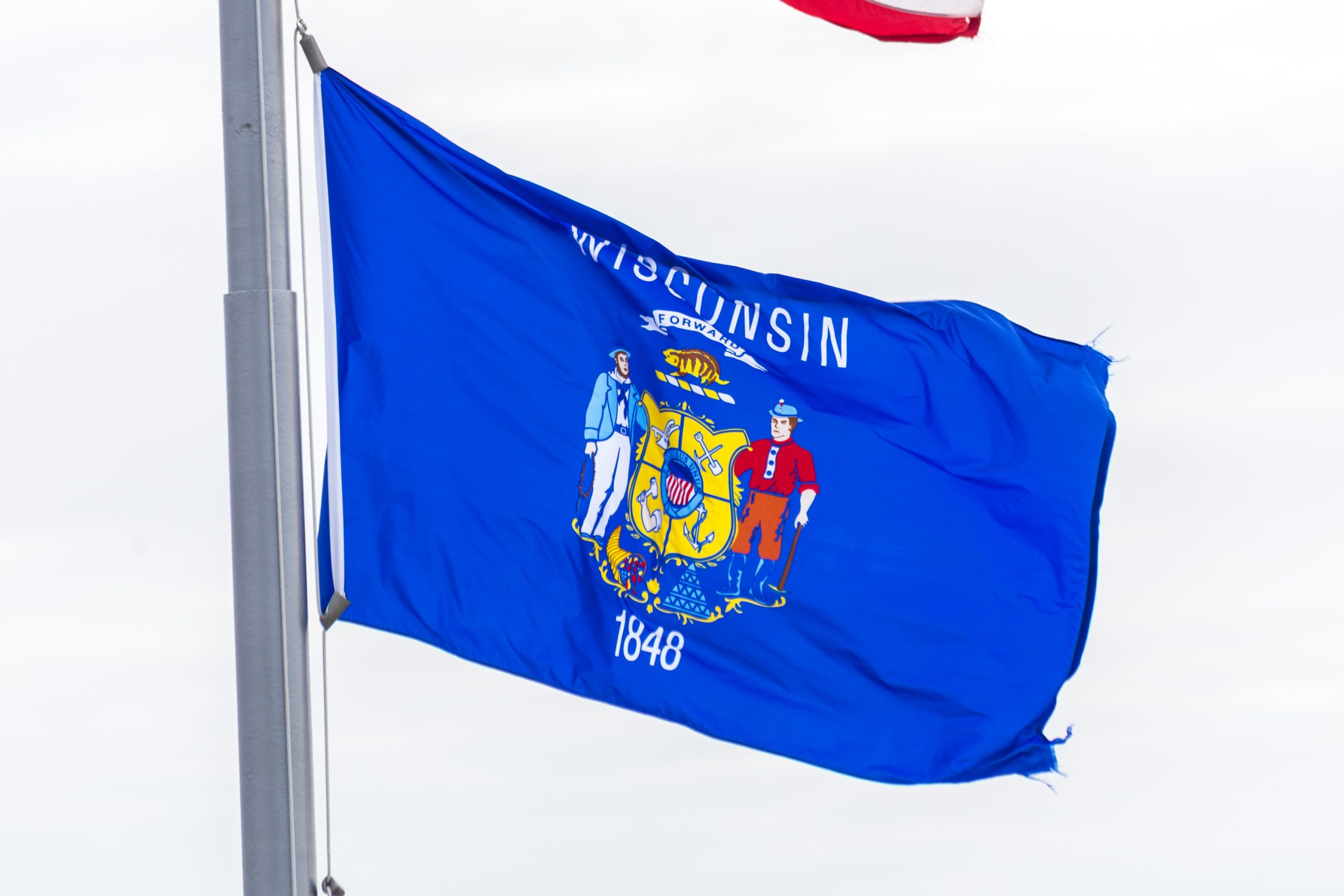 State flag flies over the Wisconsin State Capitol, Madison, Wisconsin