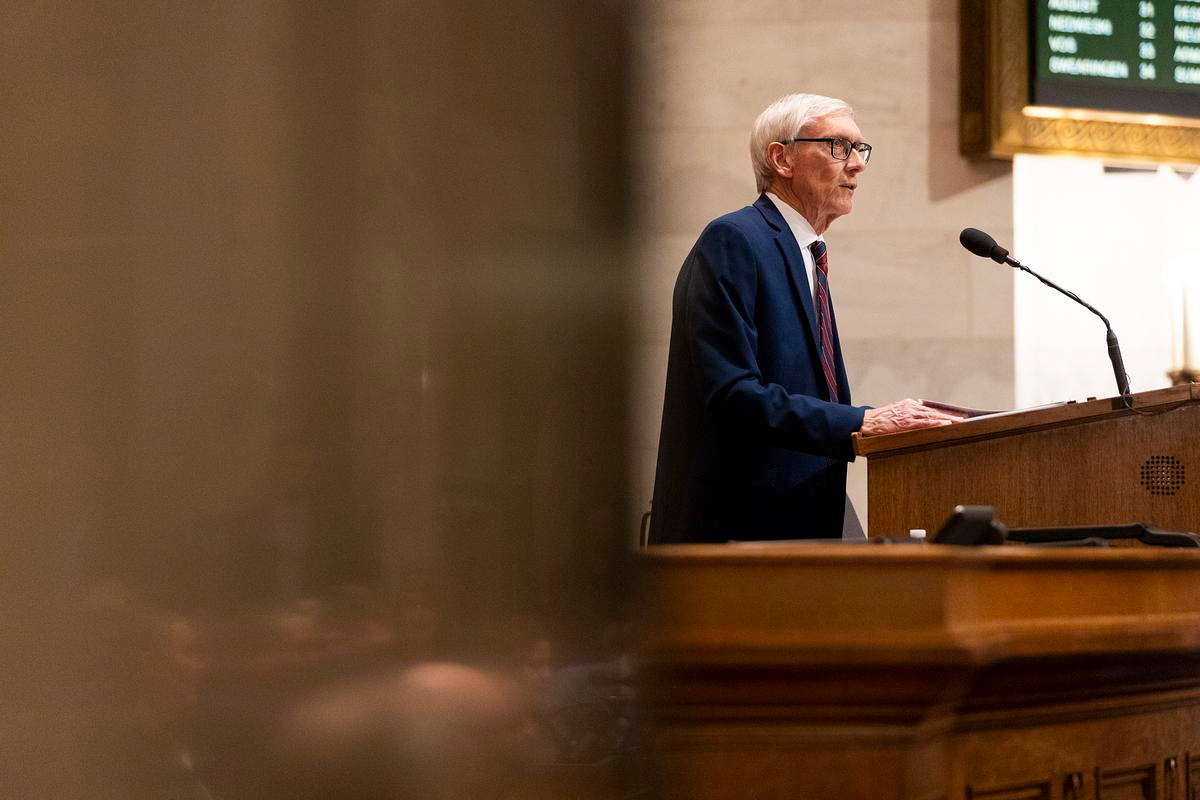 Gov. Tony Evers delivers his 2025 state budget address Feb. 18, 2025, at the Wisconsin State Capitol in Madison, Wis. His budget proposal exempts some owners of residential and agricultural land from liability for cleaning up PFAS pollution they didn’t knowingly cause. (Joe Timmerman / Wisconsin Watch)