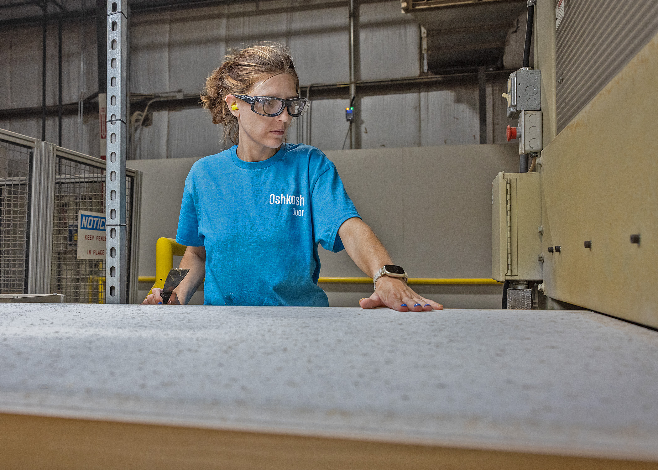 “We like complexity,” Oshkosh Door President and COO Chris Calawerts says. The company, which guarantees its work and custom-makes virtually all its orders, offers hundreds of wood species options, thousands of hardware prep options and can create complex raceways for wiring.