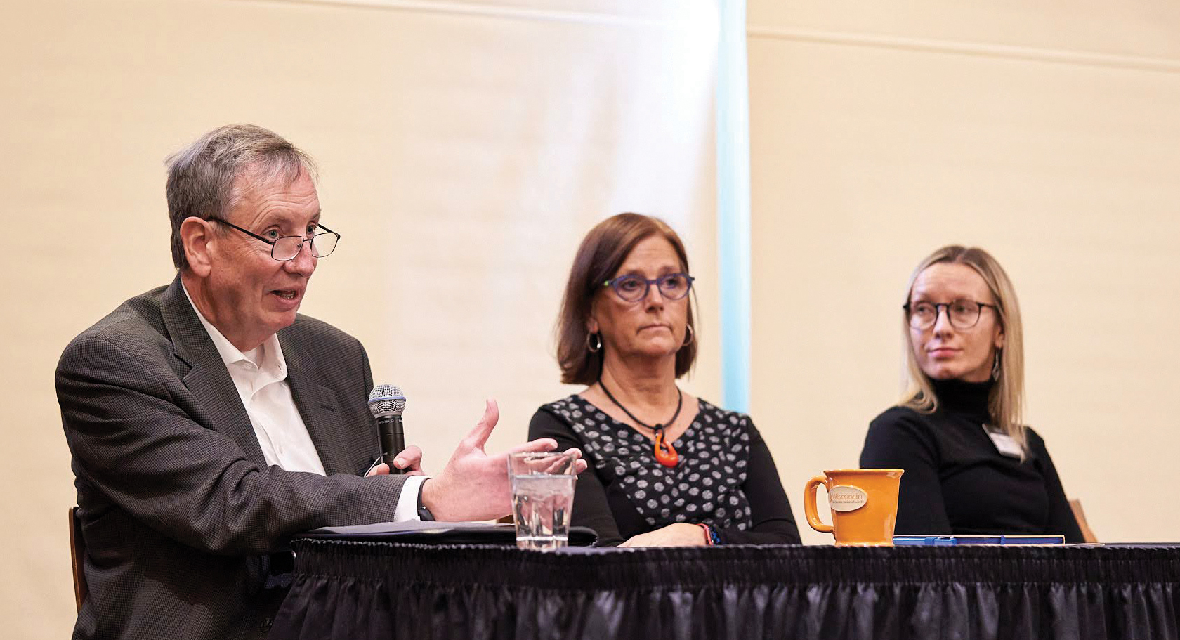 Kevin Tubbs of Oshkosh Corporation, Rochelle Guastella of Madison-based Artisan Dental and Kohler Co.’s Kayla Buszka speak at the Wisconsin Sustainable Business Council Annual Conference Nov. 16 at Lambeau Field. The three business leaders participated in a panel discussion about attaining buy-in for sustainability initiatives.