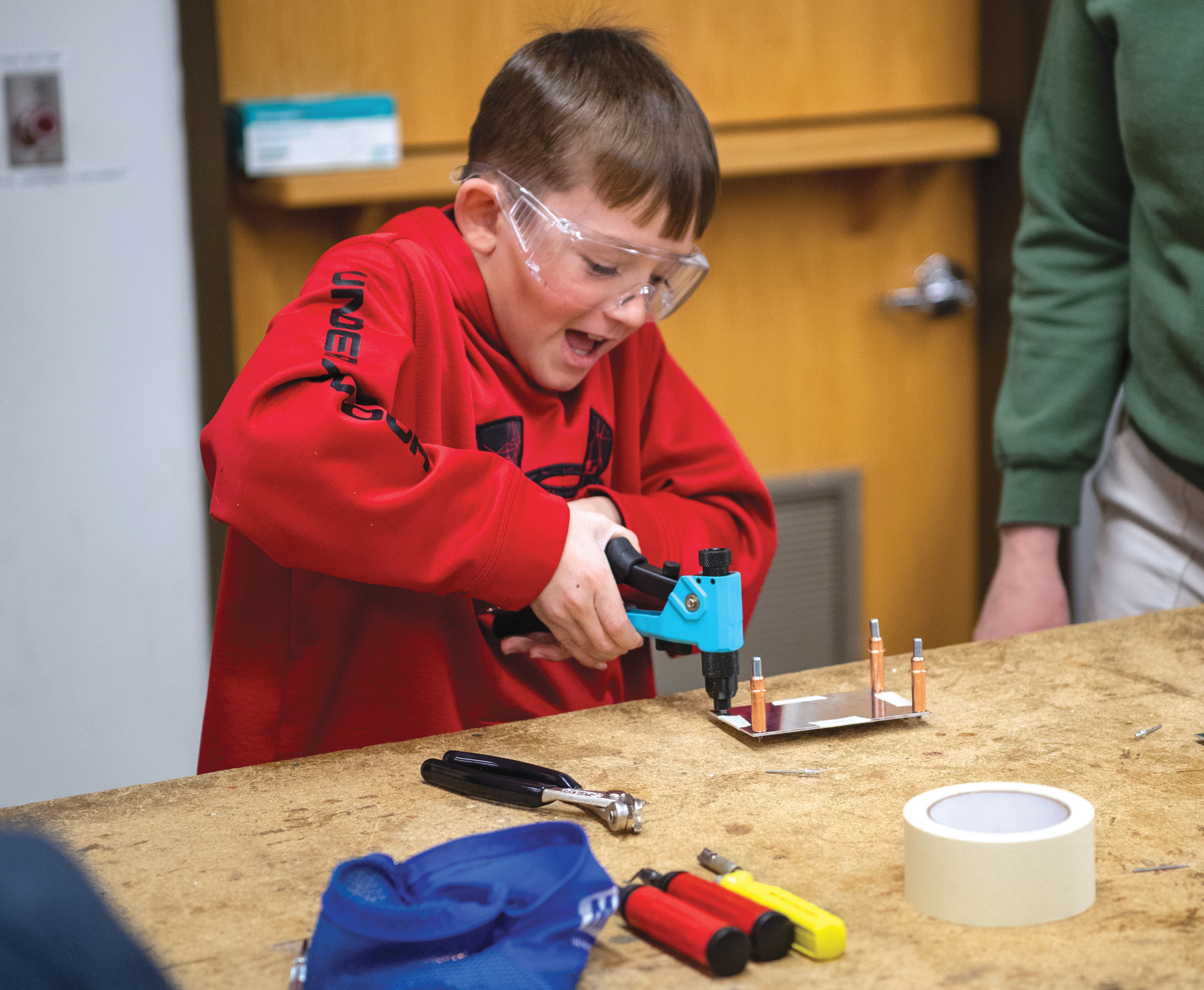 The EAA Youth Education Center, which opened in 2022, provides high-tech, hands-on learning experiences aimed at inspiring the next generation to pursue careers in aviation, including manufacturing.
