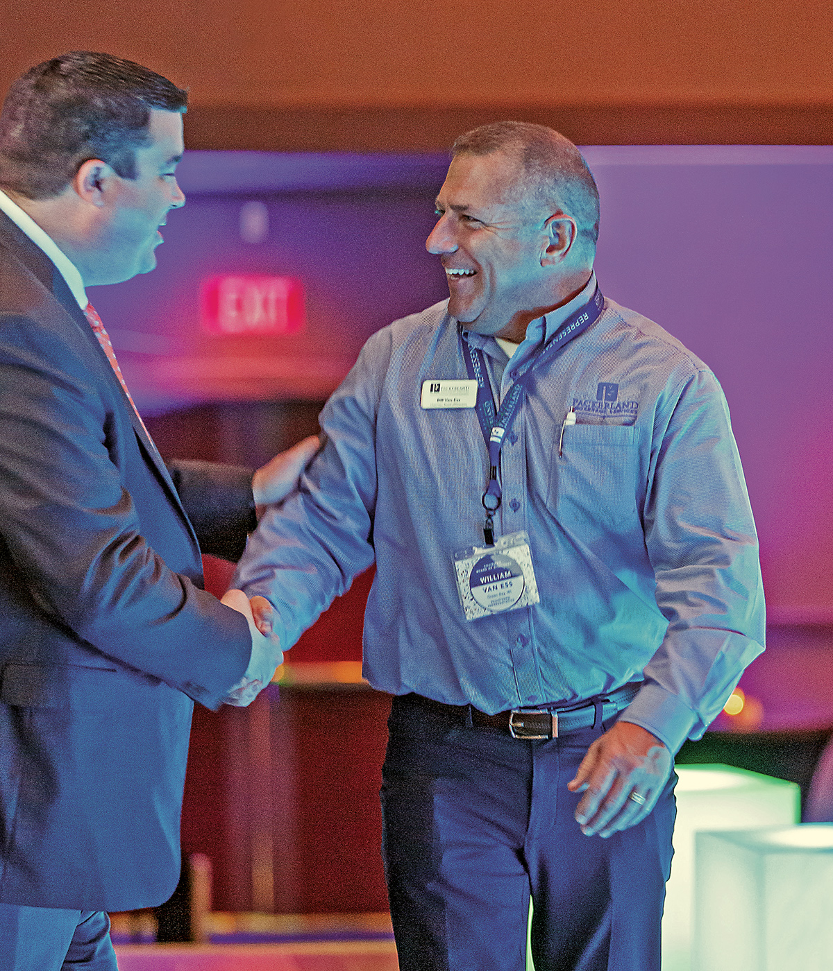 Zach Kelly, Packerland CEO/CFO, and Packerland representative Bill Van Ess