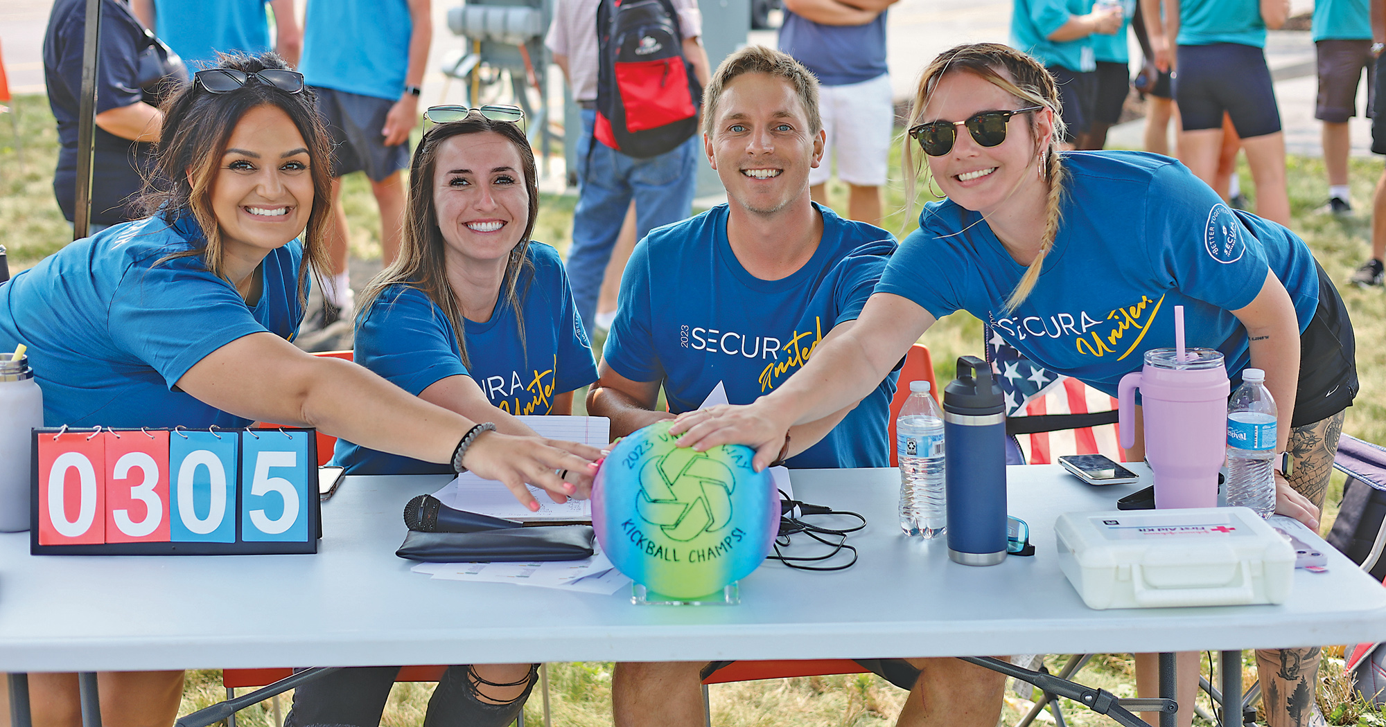 Associates participate in SECURA’s annual kickball tournament to raise funds for United Way.