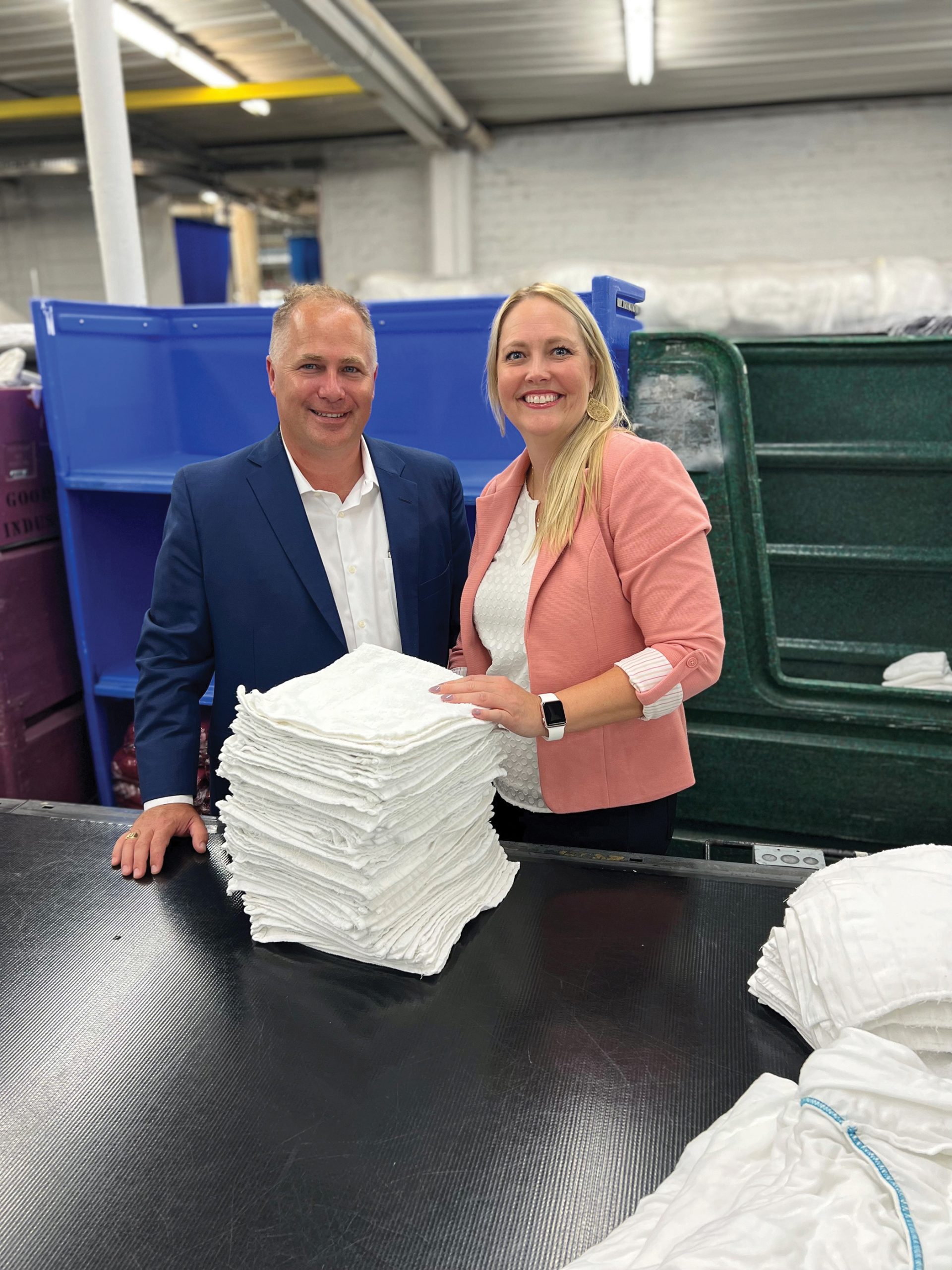 Co-owners Doug Gunderson and Sara Gunderson say more than 20,000 hospital beds are made up every week with the company’s linens.