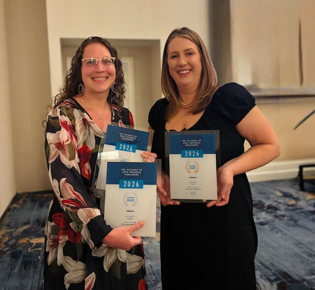 Publisher Angela O'Kray, left, and editor Amelia Compton Wolff, right, at the 2026 AABP Editorial Excellence Awards in Wilmington, North Carolina.