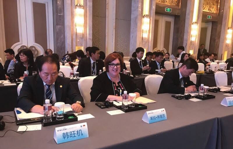 Fritts has made it a point in each of her roles to talk with business leaders in the community. Shown is Fritts representing Salt Lake City Mayor Jacki Biskupski at the World Winter Cities Association for Mayors in Shenyang, China.