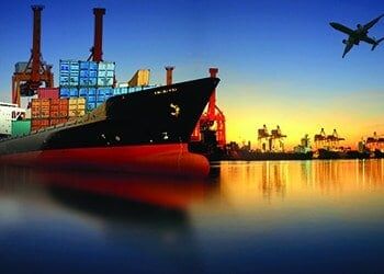 container ship in import,export port against beautiful morning light of loading ship yard use for freight and cargo shipping vessel transport